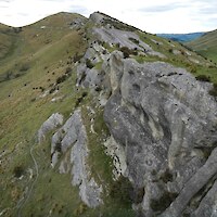 The site is characterised by steep limestone outcrops